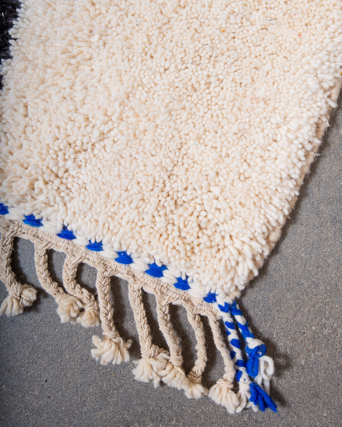 Modern, designer, handcrafted Berber rug from Morocco. Beniourain carpet with beautiful colours and patterns and fluffy wool texture.
